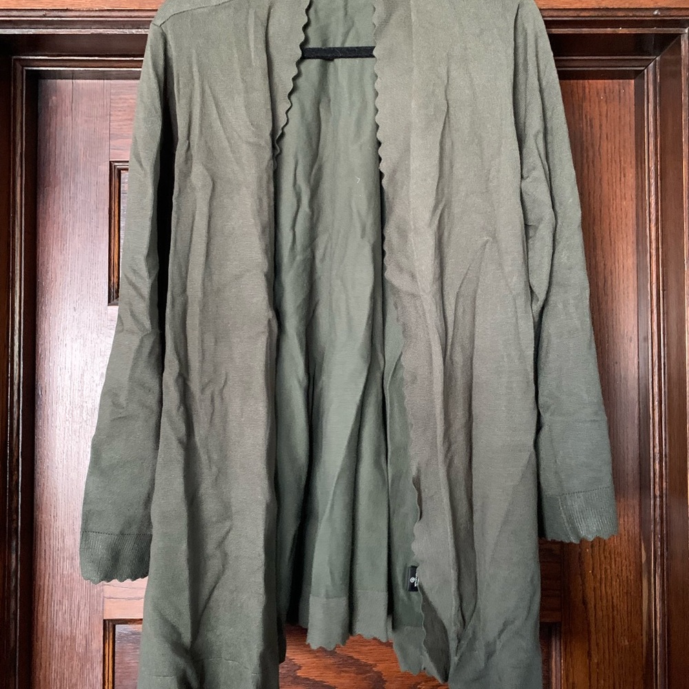 Green cardigan with scalloped edges